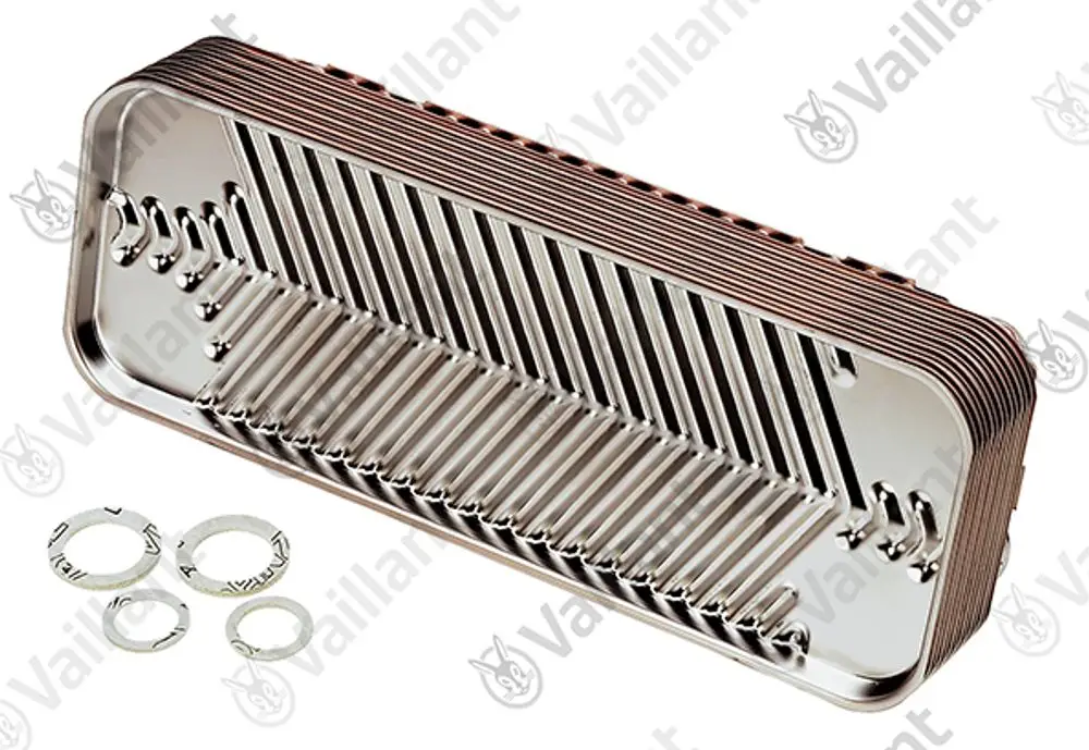 Vaillant Wärmetauscher in rechteckiger Form mit gerillter Oberfläche. Im Vordergrund sind mehrere Unterlegscheiben aus Metall zu sehen.